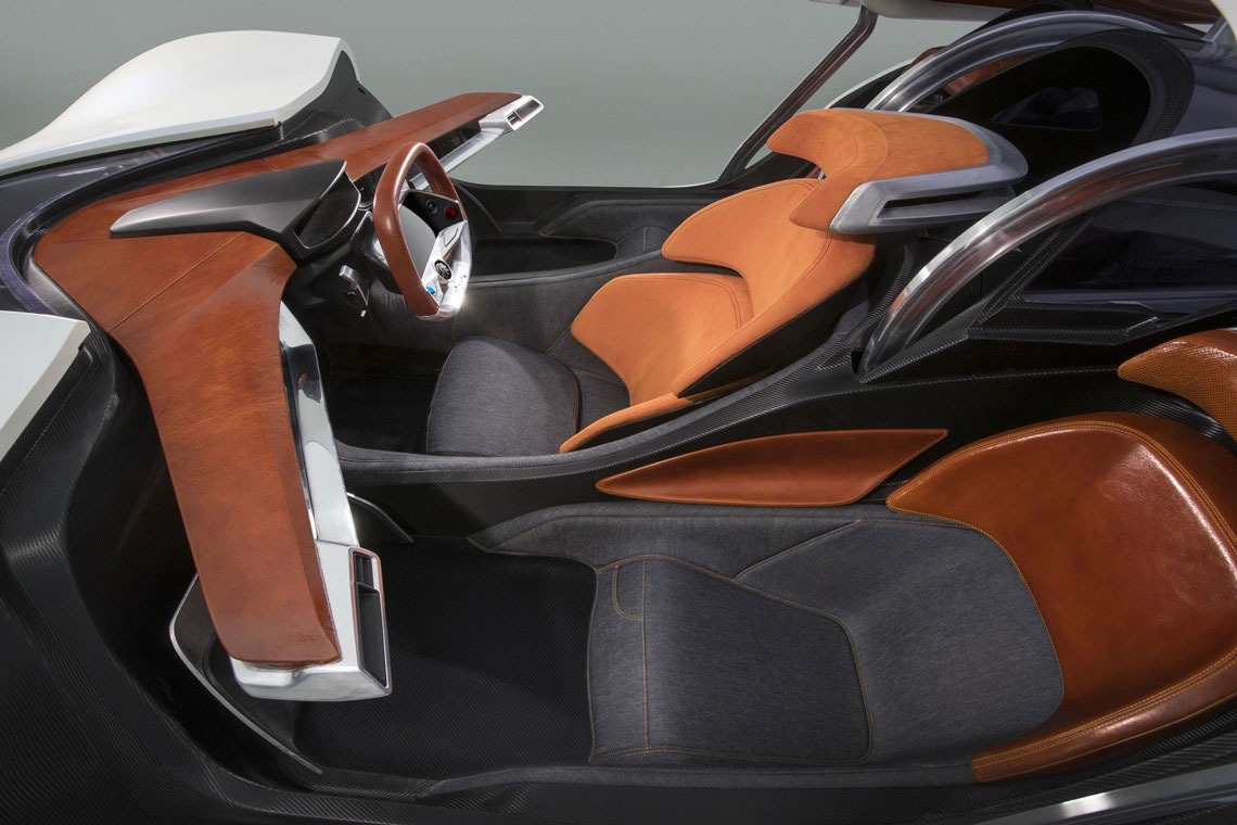 The interior trim used leather, Alcantara and denim from Pantaloni Torino. At the rear, between the microturbines, suspension components and engines, the designers carved out a place for a 60-liter boot.