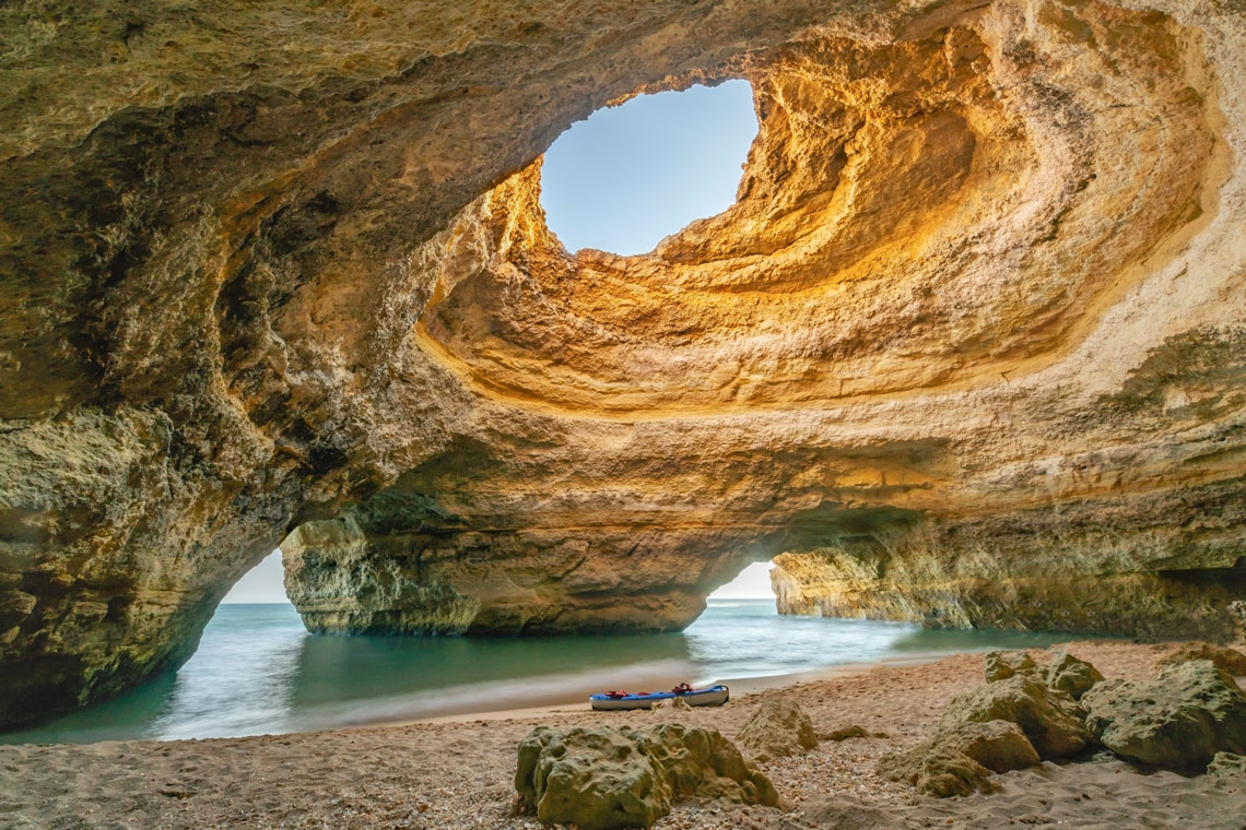 For many years, the coastal cliffs have been sharpened by winds and sea waves, creating such an amazing natural formation. The cave has a large arched entrance that is flooded with the sea. The bottom of the cave is lined with fine sand. Here you can hide from the sun and enjoy the mysterious silence.