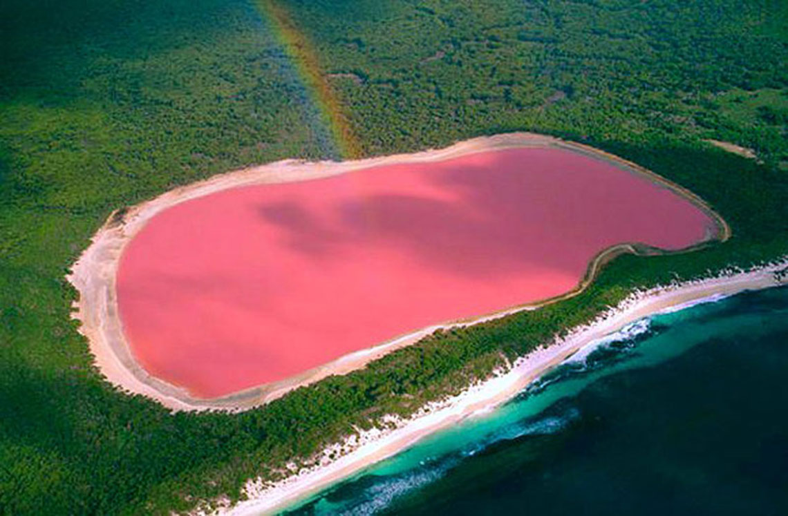 Hillier is a mineral lake, which is remarkable for its pink color of the water. It is located on the edge of Middle Island in southwestern Australia. The lake is surrounded by sand and eucalyptus forest along the edges. The color of the lake water is constant and does not change when water is taken into a separate container.