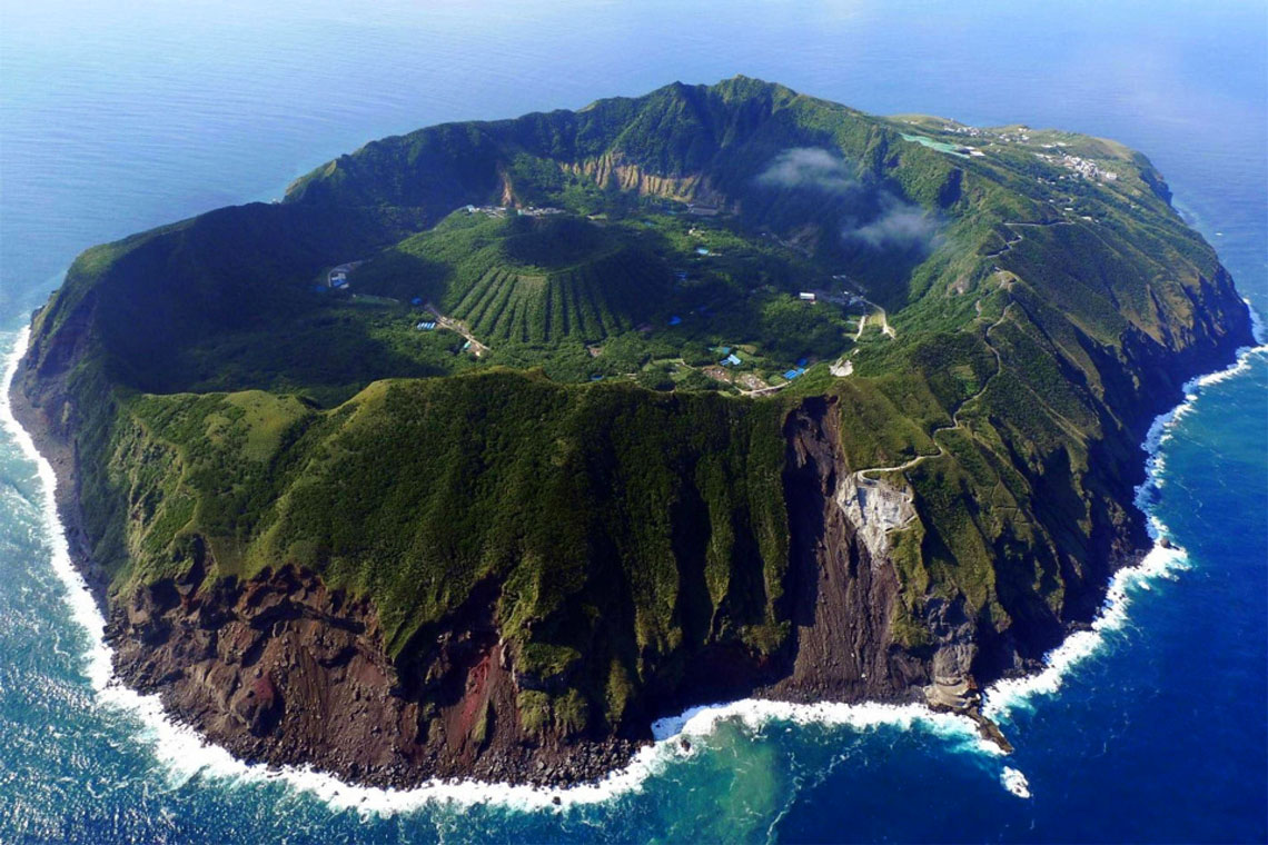 Aogashima is a volcanic island in the Philippine Sea. It is the southernmost and most isolated island in the Izu group of islands. Located 350 km south of the Japanese capital – Tokyo. The island is interesting in that its relief has bizarre alien forms.